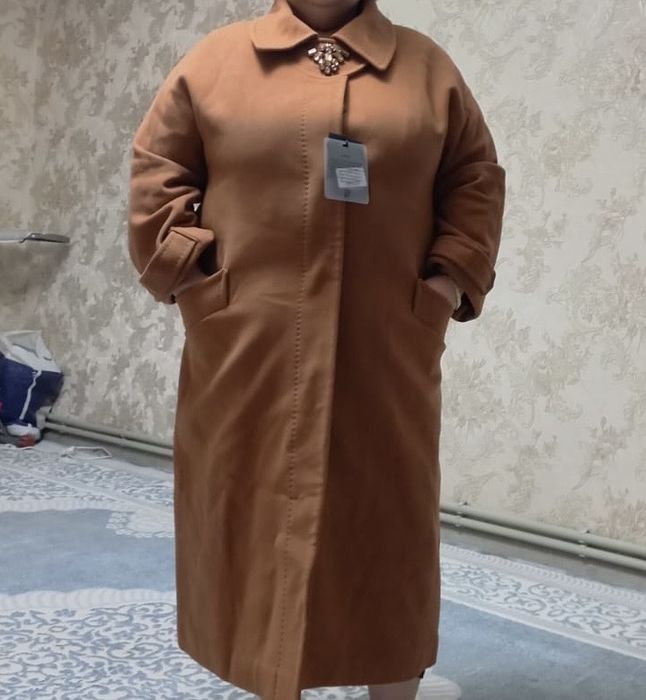 Пальто женская теплая;