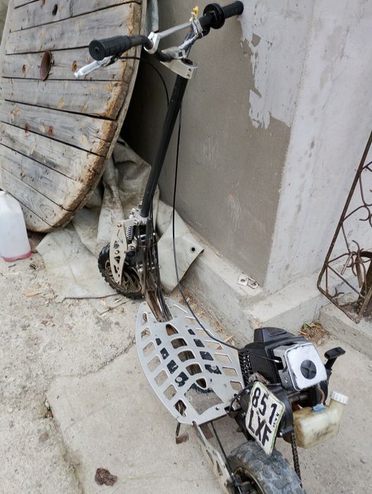 Vând trotineta Uber Scott 70x 71cc