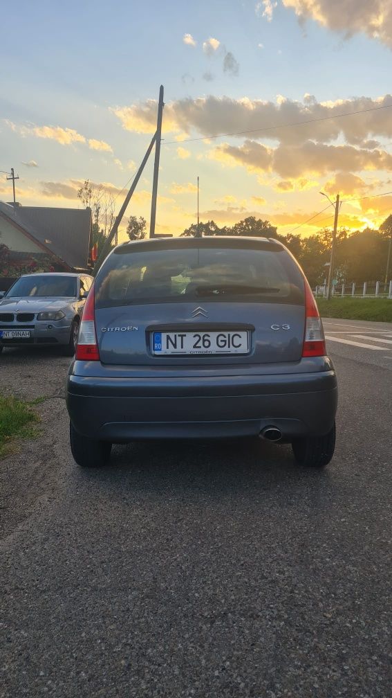 Citroen C3 model exclusive an 2009 1.4 diesel  comenzi volan consum mi