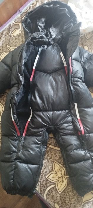 Продам новый комбез монклер