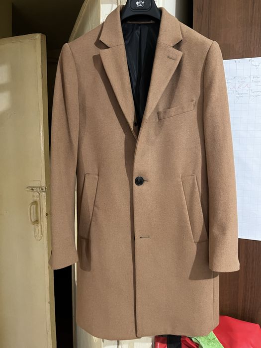 Продам новое пальто