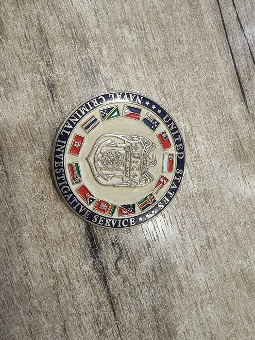 Монета NCIS Singapore