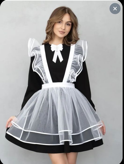 Новые школьные фартуки.