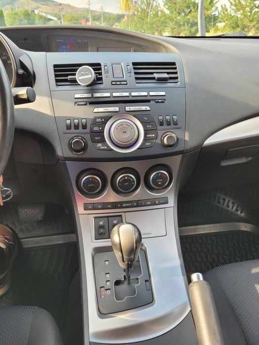 Mazda 3  Exclusive benzina/ cutie automată