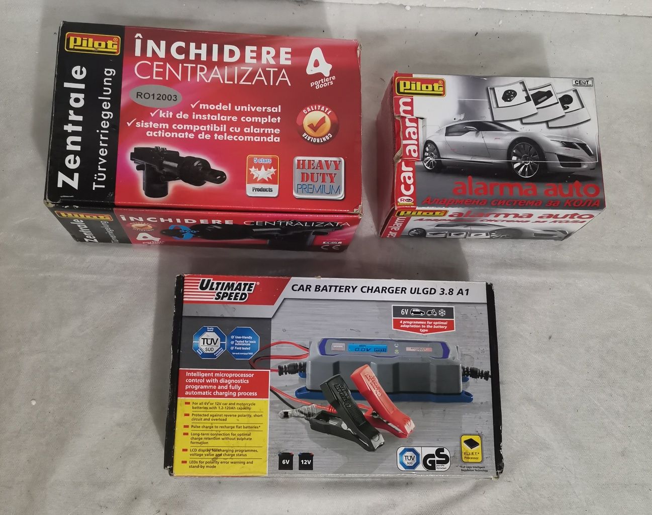 Pachet - Inchidere centralizata, Alarma auto, Incarcator baterie