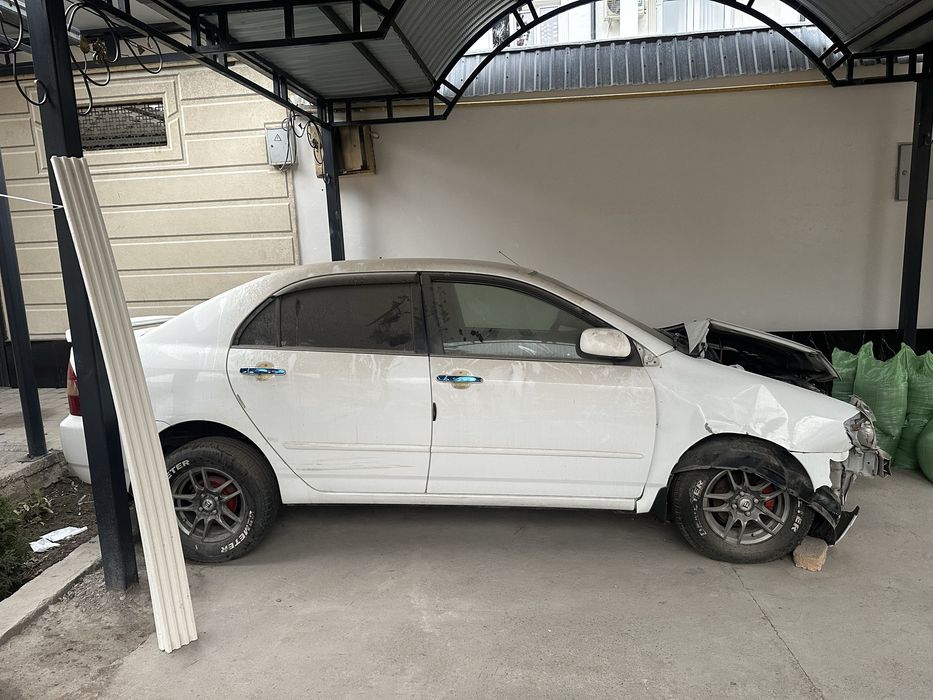 Тойота королла 2002 года