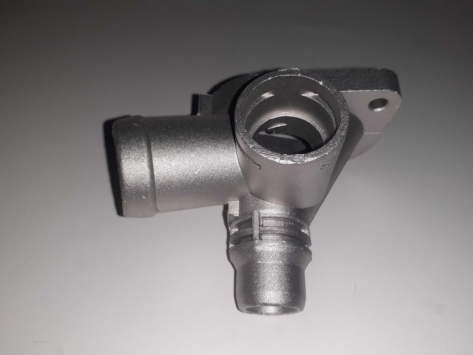 Тройник системы охлаждения Passat B5 новый