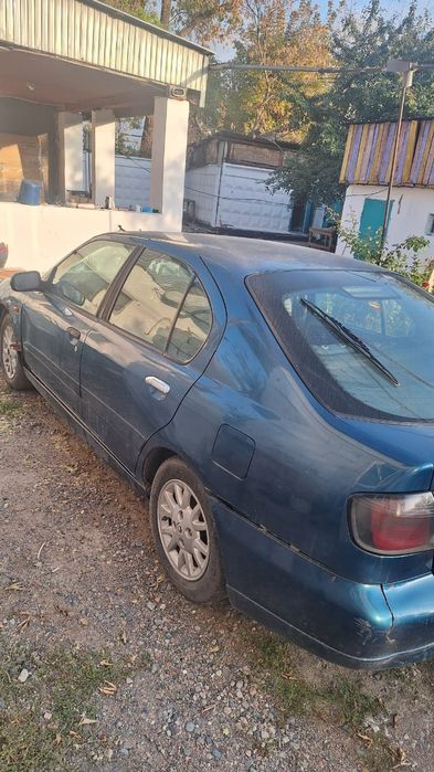 Транспорт  ниссан P11  2002
