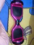 haveboard roz cu luminite pe laterala