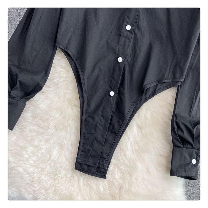 Черная ркбашка.