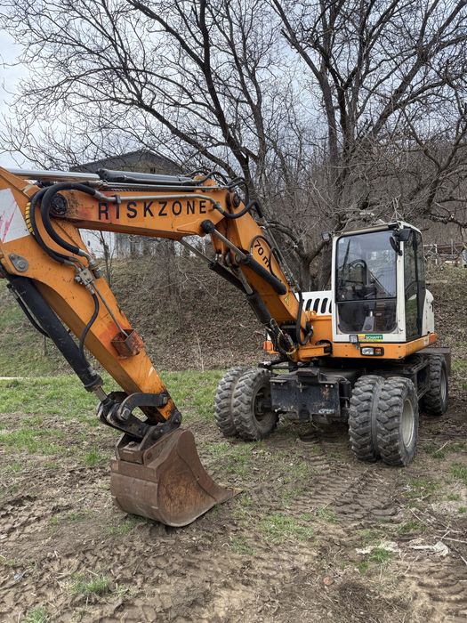 Excavator pe roti Terex TW 110