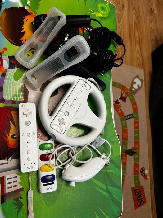 Wii impecabil cu jocuri și accesorii