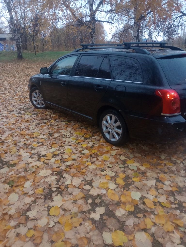 Тойота Авенсис .