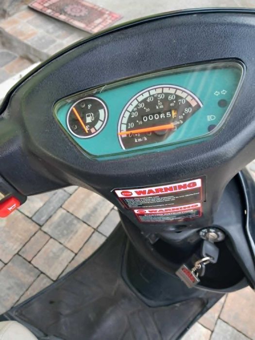 Scuter pe benzina in 4timpi 50cc