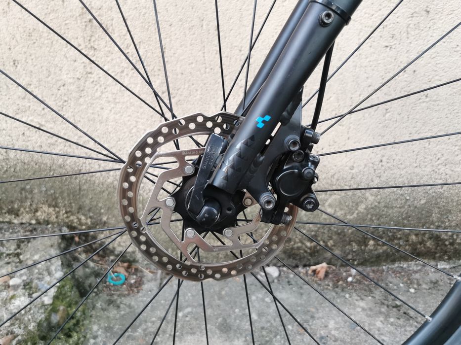 Bicicleta CUBE Hyde pe curea gravel city trekking