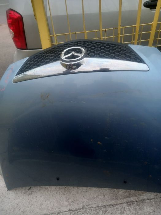 Вреден капак за Mazda 2