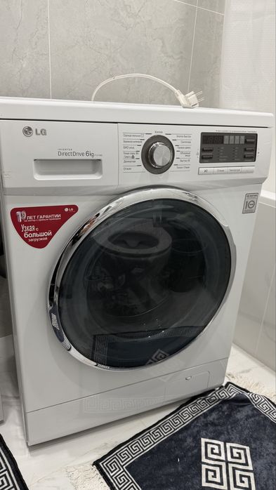 Стиральная машина фирмы LG в хорошем состоянии