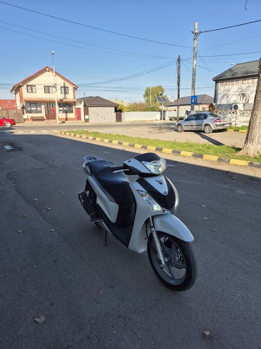 Honda sh125i injecție