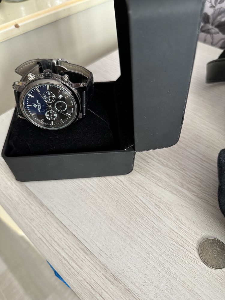 Часы Patek Philippe.