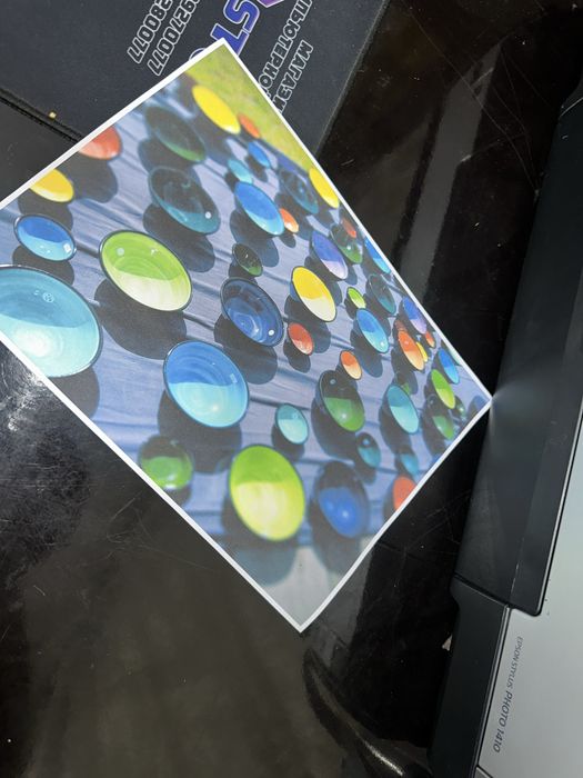 Epson Stylus PHOTO 1410 A3 pechatlari tinniq aybi yoq holati ideal