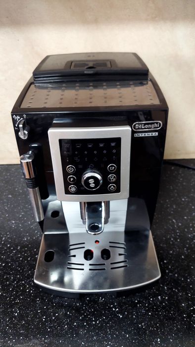 expresor aparat cafea Delonghi intensa. garanție