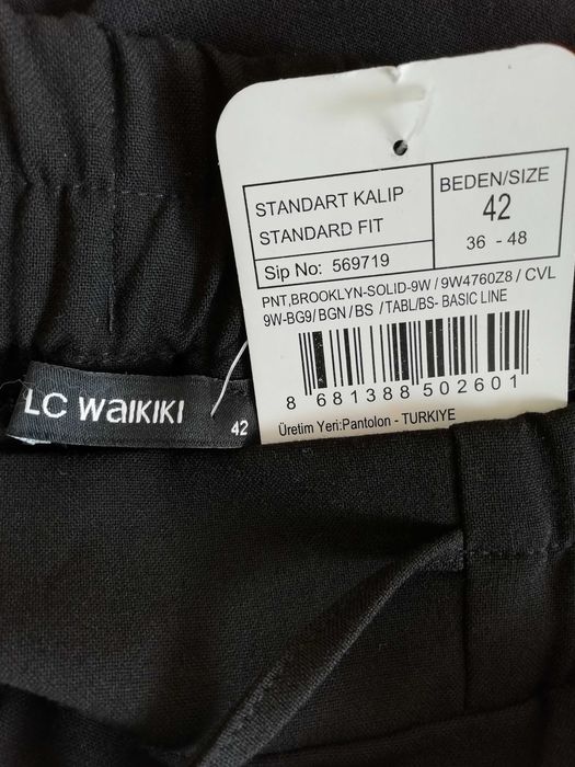 Нов дамски черен панталон 42 размер