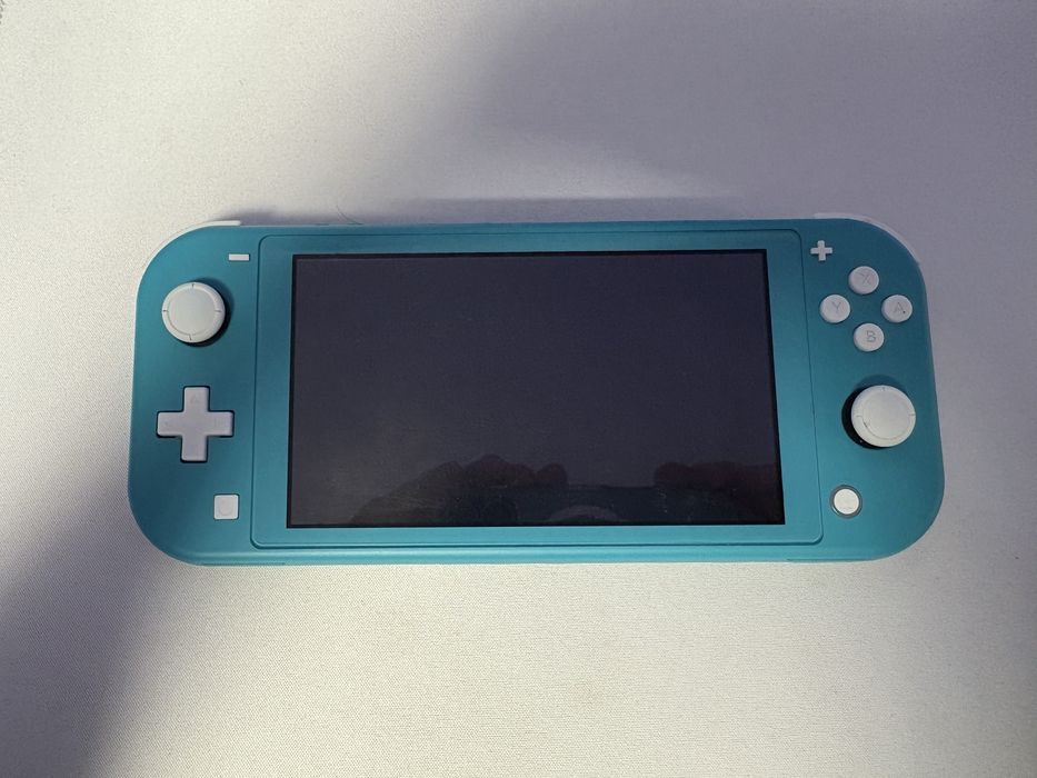 Nintendo Switch Lite +7 jocuri