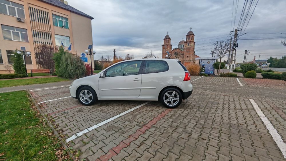 Vw golf 5 an 2009  1.4 benzina