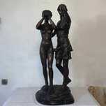 Statuie din bronz cu doua fete