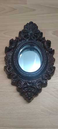 Oglindă în ramă turnată - obiect de colecție