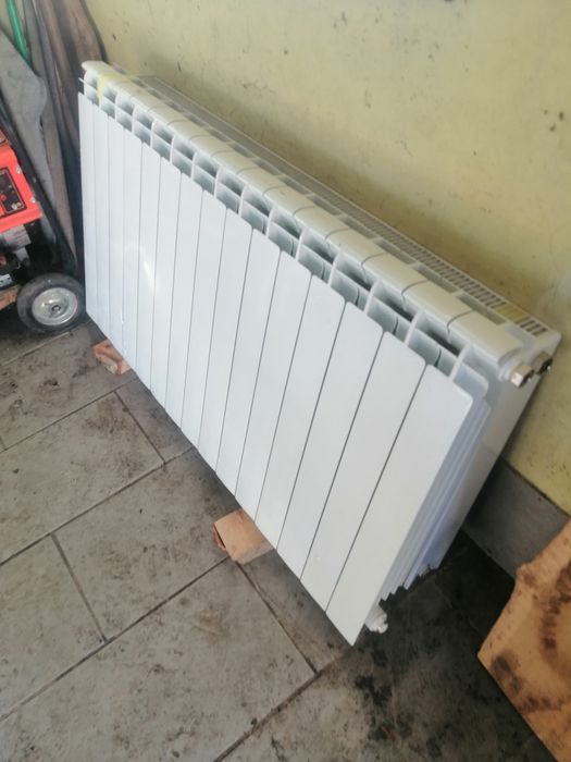 Радиатори 2бр 120 на 60см. Панелен и алуминиев