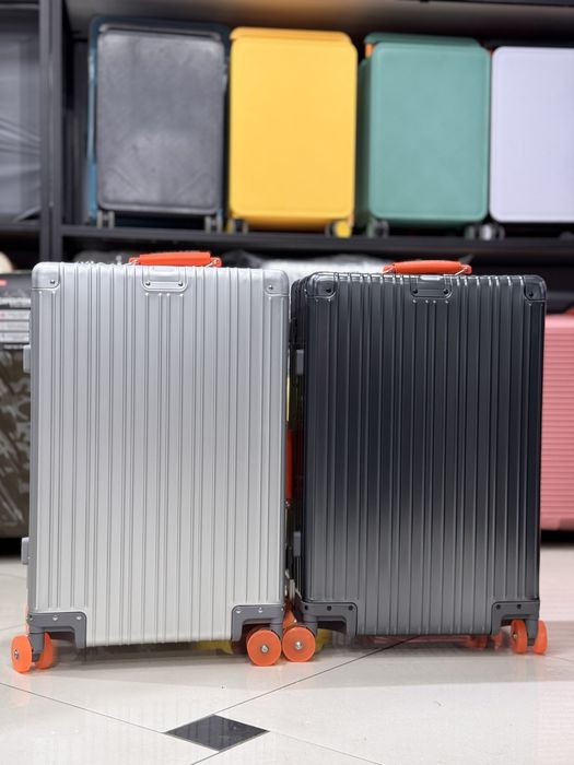 Чемоданы 4 колесные из алюминия