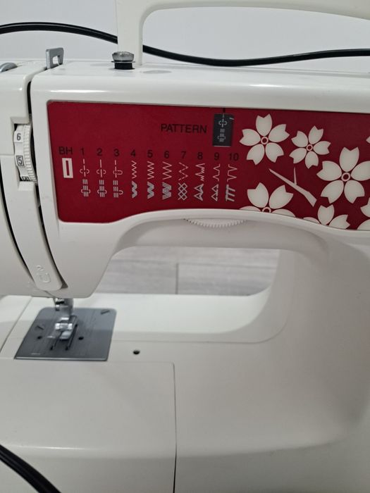 Mașina de cusut  .