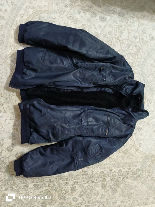 Продам куртку утепленную.