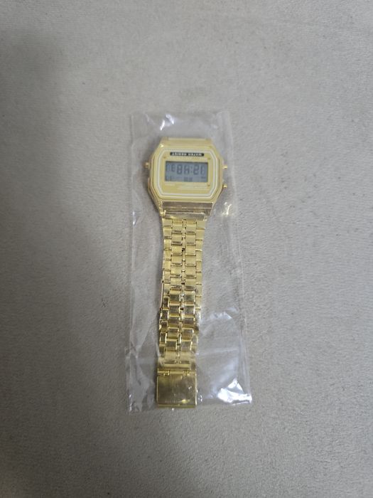 Gold digital watch