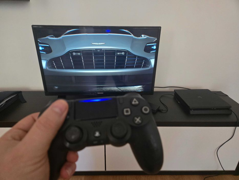 Sony Playstation 4. charge station and 4 gamepad and Need for Speed