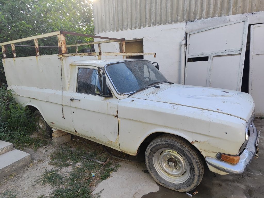 Газ 2411 белый цвет пикап тентли
