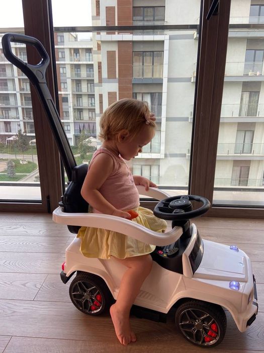 Машинка каталка детская