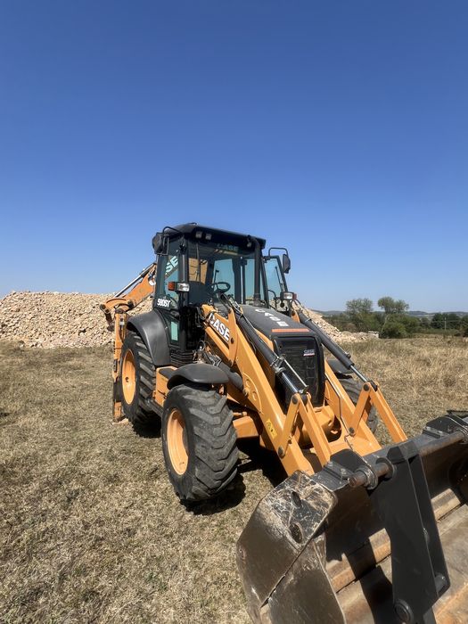 Buldoexcavator 580 ST sau schimb cu 8x4
