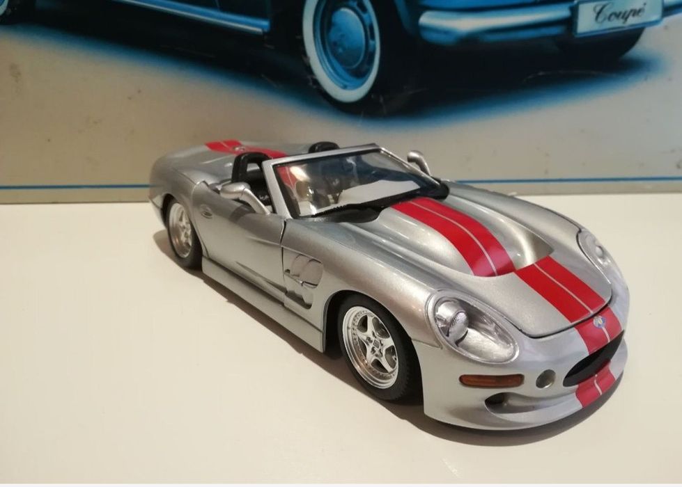 Shelby series1, anul1999 bburago 
Scara 1:18
Bburago

Pozele fac parte