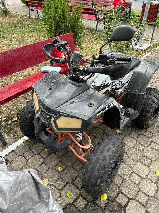 ATV  de 125. Nu prea o fost folosit mai muult o stat