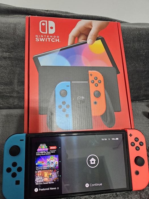 Nintendo Switch OLED cu accesorii complete, husă transport + joc Zelda