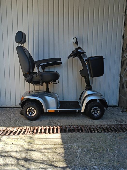 Carucior scuter electric scaun dizabilitati  carut tricieleta handicap