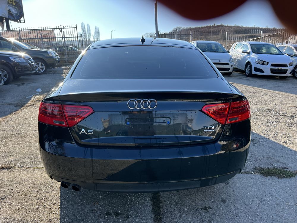 Audi A5 2.0TDI spotrback Quattro .