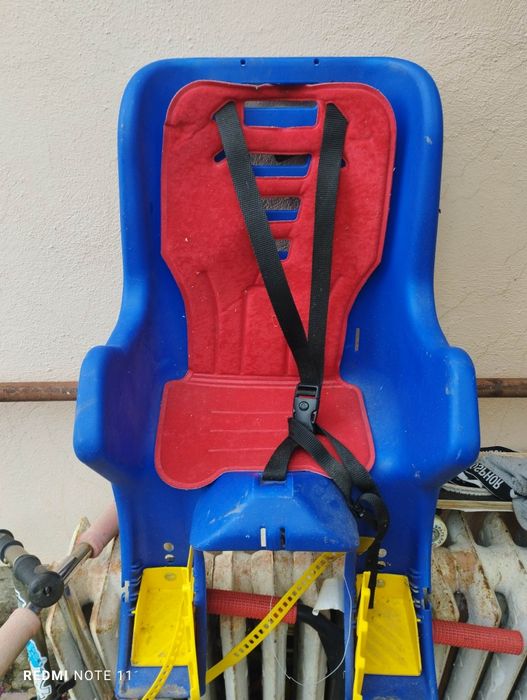 Scaun de copii pentru bicicletă, cumpărat din magazin Hervis