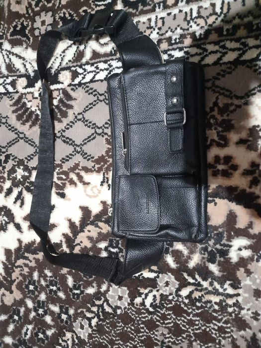 Продаю барсетку за 1500тг состояние хорошее не где не порвоно