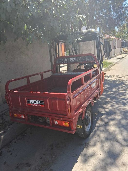Triciclu basculantă