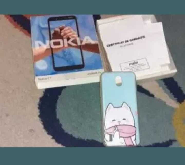 Telefon Nokia C1, ca nou + husa + prinzatoare