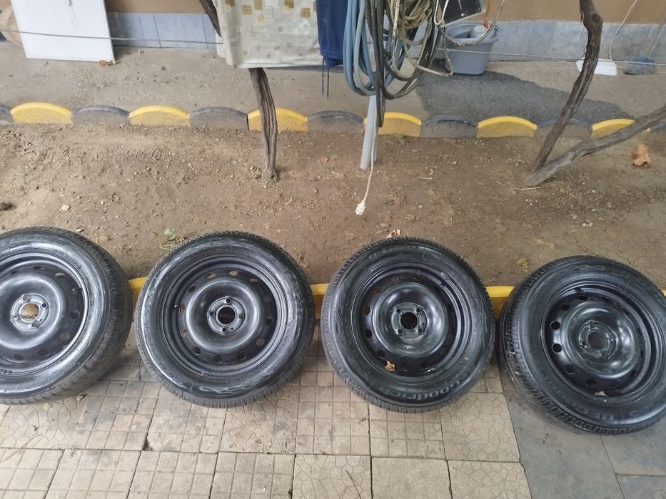 Roti Logan 185/65/15 cu anvelope bfgoodrich de vara profil forte bun