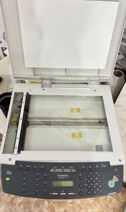 МФУ Canon i-SENSYS MF4140 , лазерный Ч/Б + Факс
